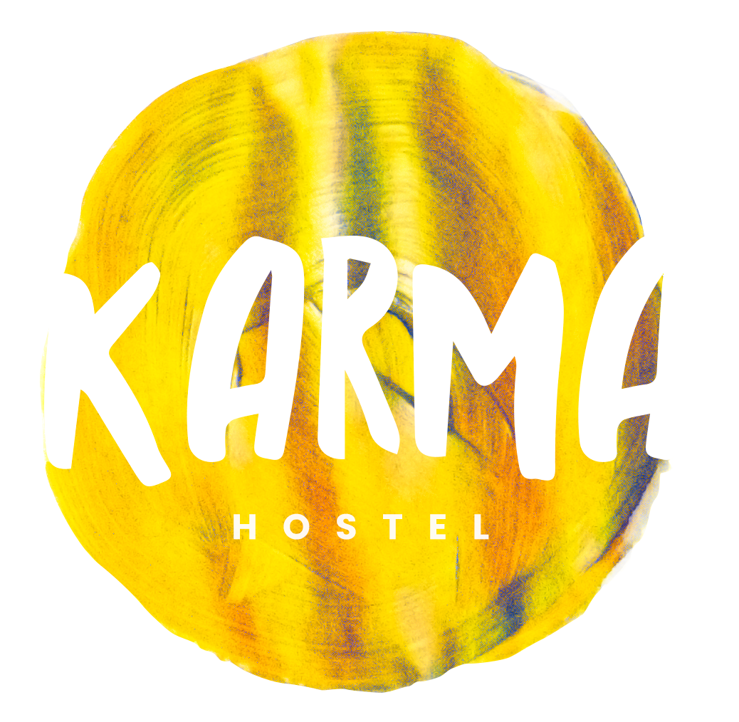 Logo for Karma Hostel featuring the word
